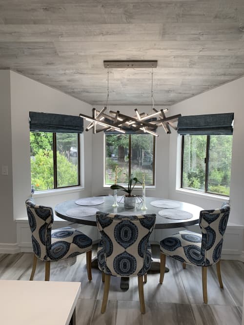 Customized INIFINITY for Martine | Chandeliers by Next Level Lighting. Item composed of wood