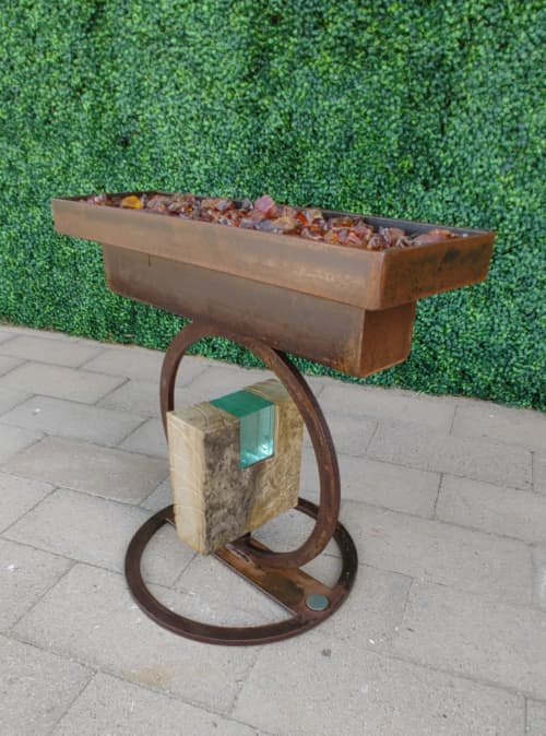 Fire Feature | Coffee Table in Tables by Brian Schader. Item composed of bronze & glass compatible with contemporary and industrial style