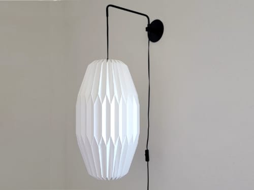 Industrial sconce with pleated LONG OVAL lampshade | Sconces by Studio Pleat. Item made of metal with paper works with mid century modern & contemporary style
