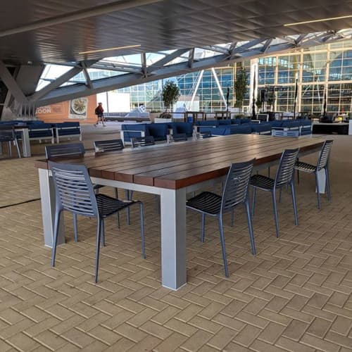 Ipe Outdoor Dining Tables | Communal Table in Tables by Where Wood Meets Steel | Denver International Airport in Denver. Item made of wood & steel compatible with industrial and modern style