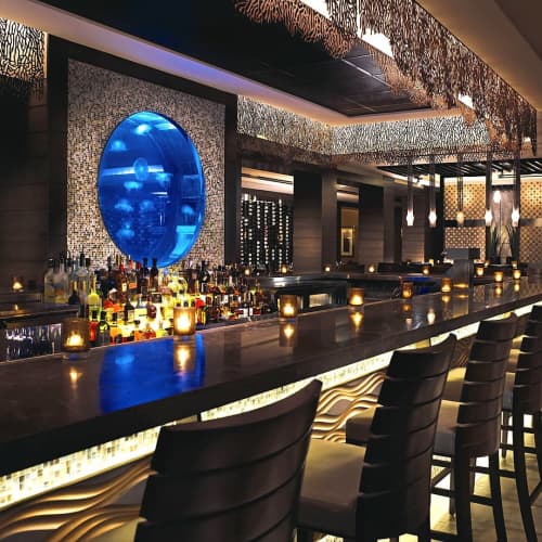 Sea Fan Panels | Sconces by Lightwave Laser | The Seagate Hotel & Spa in Delray Beach. Item composed of glass