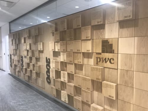 Wood Founders Wall- Wood Wall Sculpture | Paneling in Wall Treatments by Scott Troxel Art | PricewaterhouseCoopers LLP in New York. Item composed of oak wood