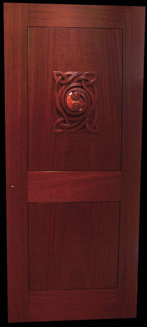 Carved mahogany door (Master bedroom entrance) | Wall Sculpture in Wall Hangings by Shane Durnford Studios. Item composed of wood and glass