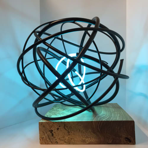 Neon Orb I | Public Sculptures by Mark Beattie MRSS | Park Plaza London Waterloo in London. Item made of wood with copper