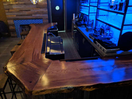 Oak Bar | Countertop in Furniture by Michael Colemire Designs | Beehive Augusta Tavern in Augusta. Item made of oak wood & metal