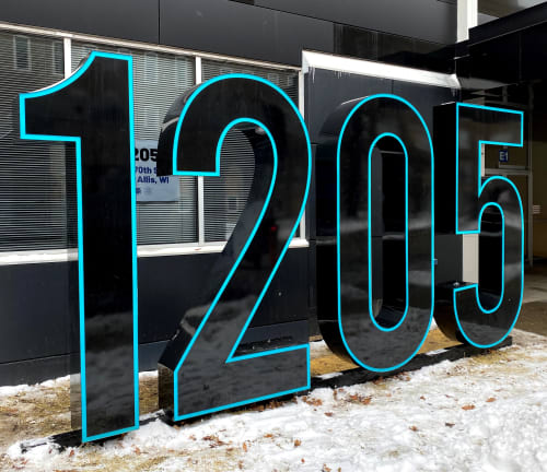 West Quarter Development | Signage by Jones Sign Company. Item made of metal