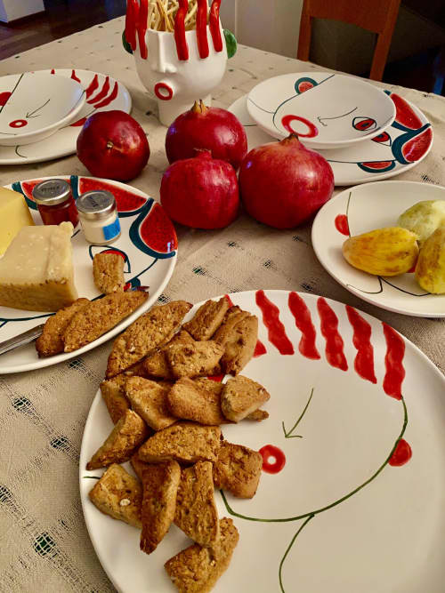 Plate with face of sellers | Dinnerware by Patrizia Italiano. Item composed of ceramic