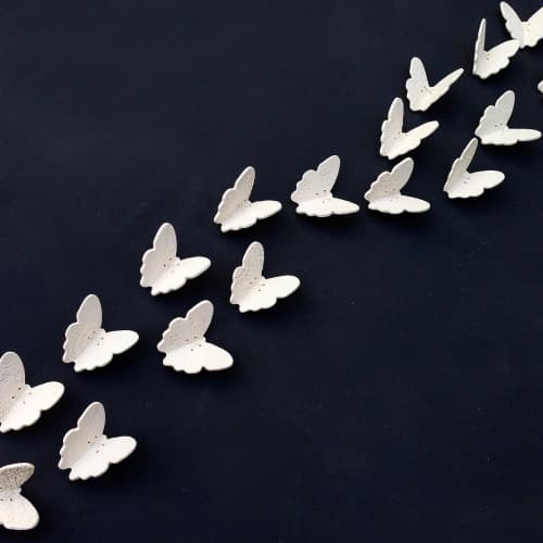 Porcelain butterfly group wall art installation. Textured modular flexible wall sculpture | Wall Hangings by Elizabeth Prince Ceramics