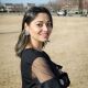 Nisha T