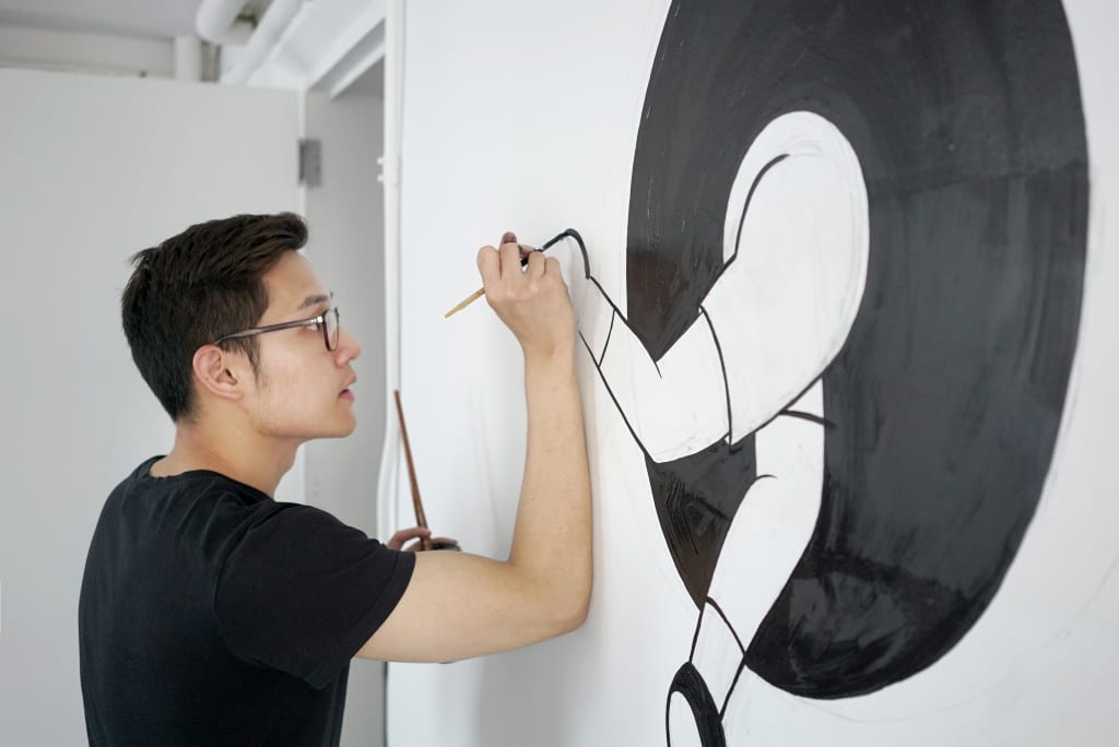 Escaping From The Box, custom mural by Kantapon Metheekul in this NY Private office on Wescover. Black and white