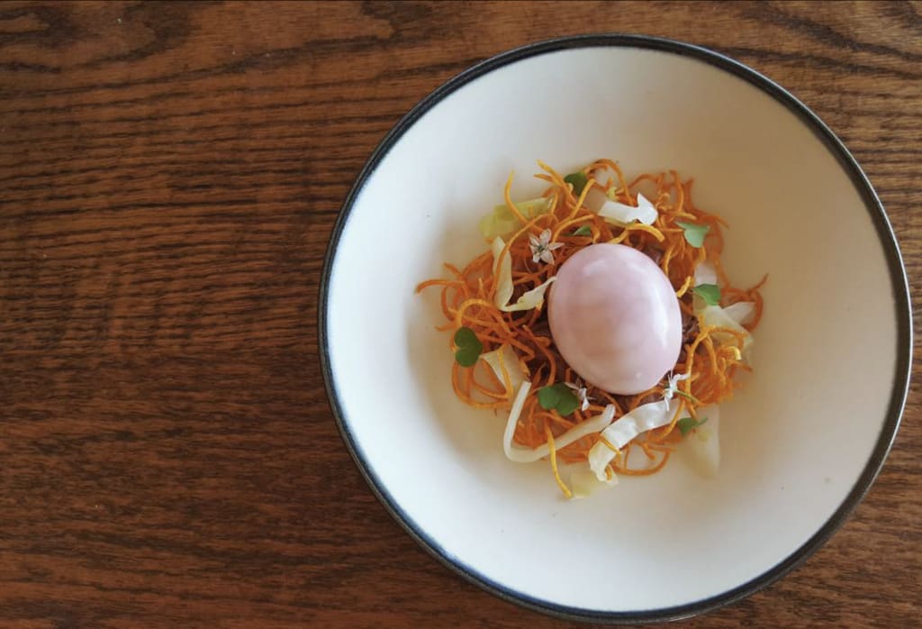 Simple, rustic ceramic plates at Austin restaurant Barley Swine by artist Keith Kreeger on Wescover