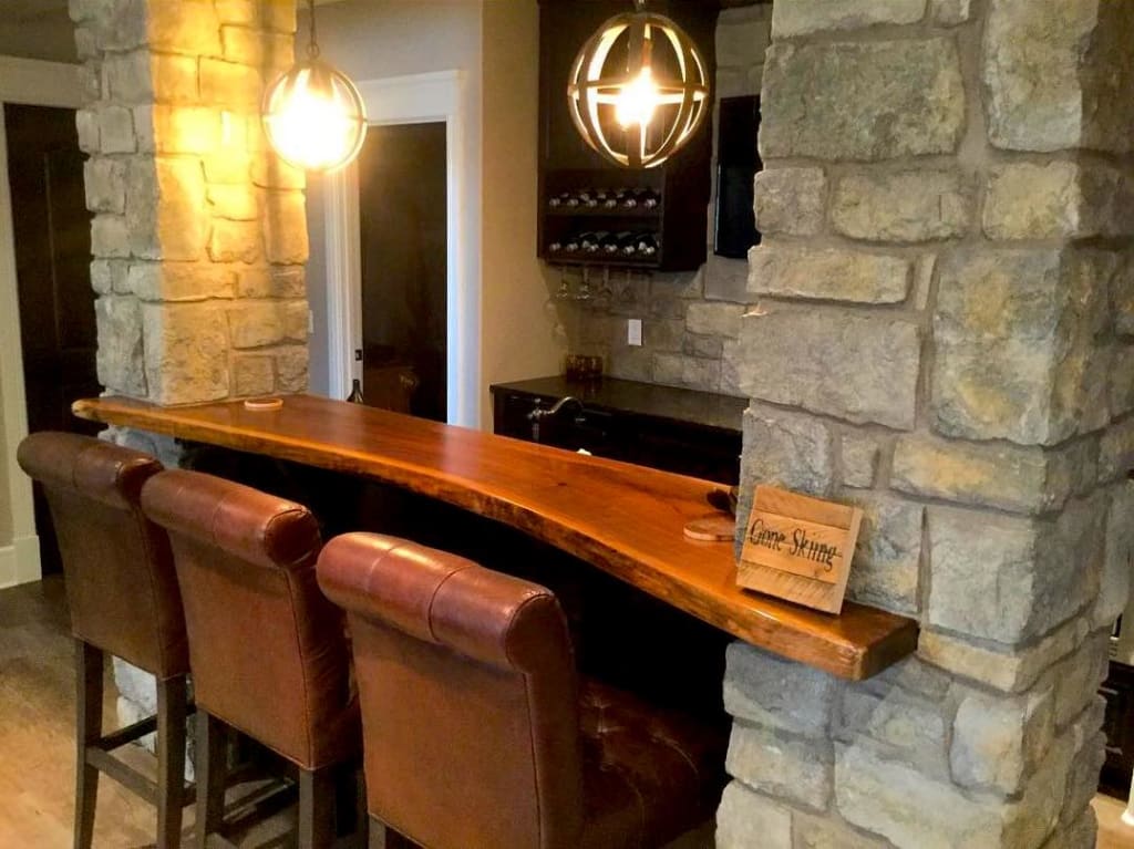 Live edge black walnut bar top custom built by Black Forest Wood Co. suits perfectly for a customer's new home.