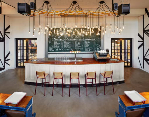 Blom & Blom's Laboratory Glass Beaker Lighting at Generator Hostel
