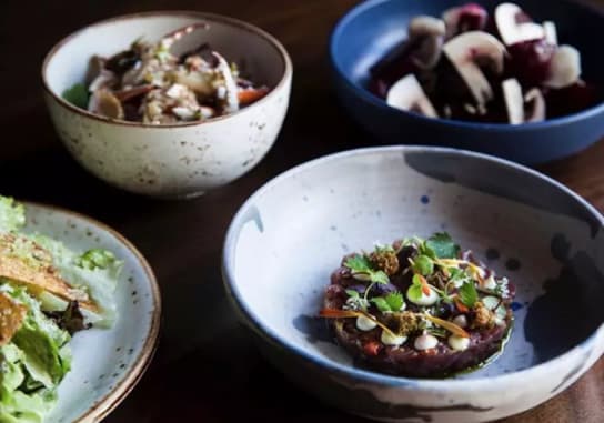 Rustic, Stonewear serving bowl by Settle Ceramic atFixe Restaurant in Austin, Texas seen on Wescover.
