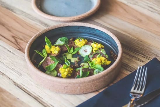 Small, rustic, ceramic bowl at Barley Swine Restaurant in Austin, Texas by sunset canyon pottery on Wescover.