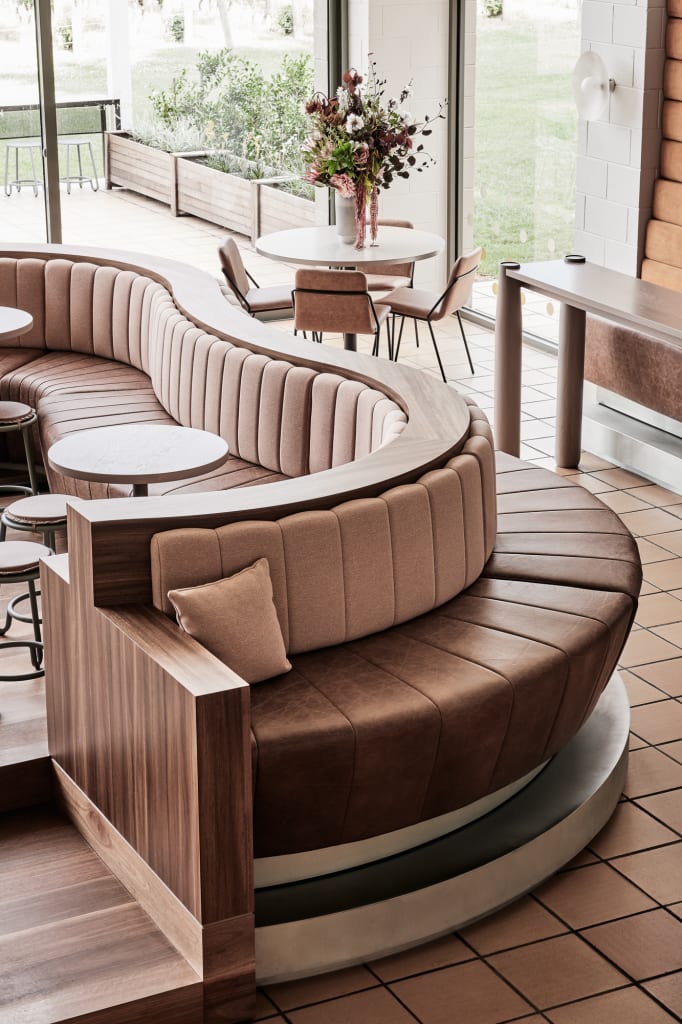 beige pink brown aged leather booth