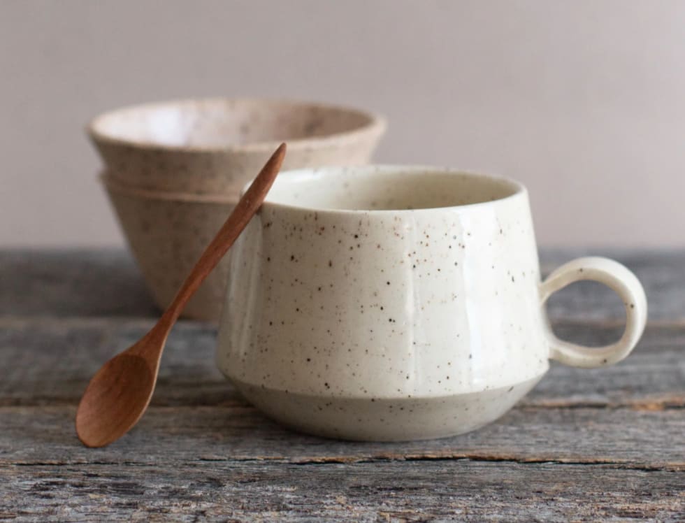 White speckled ceramic mug