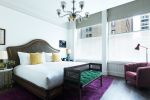Savoy Chandelier | Chandeliers by Martin Brudnizki Design Studio | The Beekman, A Thompson Hotel in New York