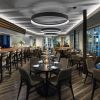 Custom Aluminum Circle Fixtures | Chandeliers by CP Lighting | Mediterraneo Restaurant in Greenwich. Item composed of aluminum