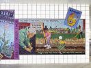 Cannas & Corn: A Community Garden | Public Mosaics by Olivia Gude | Central Park (CTA Pink) in Chicago