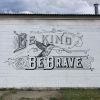 'Be Kind. Be Brave’ Mural | Street Murals by Josh Scheuerman. Item composed of synthetic