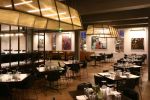 Custom Ceiling Fixture | Chandeliers by CP Lighting | Vespa Restaurant in Westport. Item composed of brass