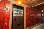 Custom Walls Lined With High School Lockers | Interior Design by Houston Hospitality | Break Room 86 in Los Angeles