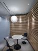 Orrick Architectural Feature Walls | Paneling in Wall Treatments by Amuneal | Orrick, Herrington & Sutcliffe, LLP in New York. Item made of wood