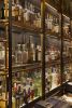 Eventi Hotel Collector’s Shelving System | Storage by Amuneal | Kimpton Hotel Eventi in New York. Item made of wood with metal