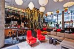 Red Repos Chair | Chairs by Antonio Citterio | citizenM New York in New York