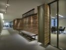 Orrick Architectural Feature Walls | Paneling in Wall Treatments by Amuneal | Orrick, Herrington & Sutcliffe, LLP in New York. Item made of wood