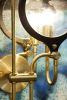 Double Lens Sconce | Sconces by Neptune Glassworks | The Alexandria in San Diego. Item composed of brass and glass