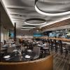 Custom Aluminum Circle Fixtures | Chandeliers by CP Lighting | Mediterraneo Restaurant in Greenwich. Item composed of aluminum