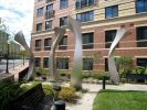 Lotus Columns | Public Sculptures by Mary Ann E. Mears. Item made of metal