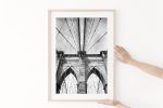 Black and white "Brooklyn Bridge" photography print | Photography by PappasBland. Item made of paper works with mid century modern & transitional style