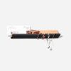 Re-entry | Shelving in Storage by Formr. Item composed of wood and brass