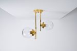 Stockton | Chandeliers by Illuminate Vintage. Item made of brass with glass