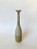 White speckled tall decorative bottle No. 7 | Vase in Vases & Vessels by Dana Chieco