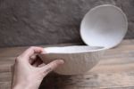 Textured speckled white handmade bowl, natural minimal | Dinnerware by Laima Ceramics. Item composed of stoneware in minimalism or rustic style