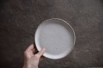 Speckled white irregular plate, handmade handcrafted | Dinnerware by Laima Ceramics. Item made of stoneware works with rustic style
