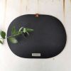 Black felt oval table placemats "bon appetit!". Set of 2 | Tableware by DecoMundo Home. Item composed of fabric and aluminum in minimalism or industrial style