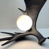 Moose Antler Lamp - Black | Table Lamp in Lamps by Farmhaus + Co.. Item composed of ceramic