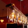 Industrial Bar Chandelier Linear Suspension | Chandeliers by Michael McHale Designs. Item made of glass