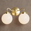Norwood | Sconces by Illuminate Vintage. Item made of brass & glass