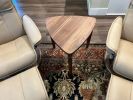 Modern Triangular Side Table: Hand-Sculpted Leg End Table, USA made | Tables by Marco Bogazzi