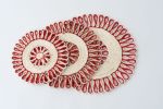 Handwoven Seagrass Placemat | Trivet | Red | Tableware by NEEPA HUT. Item composed of fabric