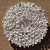 Wall sculpture on a 14" round canvas, wreath art, organic | Wall Hangings by Natasha Kanevski. Item composed of wood & canvas compatible with minimalism and contemporary style