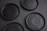 Black matte stoneware saucer/small plate/little dish | Tableware by Laima Ceramics. Item composed of stoneware compatible with minimalism and contemporary style