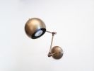 LED Adjustable Wall Globe Sconce - Industrial Ball Light | Sconces by Retro Steam Works. Item composed of brass in industrial style