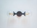 2-Arm Modern Antique Brass Wall Sconce Clear Glass Orbs | Sconces by Retro Steam Works. Item composed of metal in industrial style